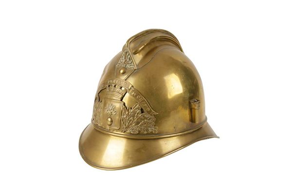 A BRASS FIRE HELMET from DuChamp Fire Brigade of France