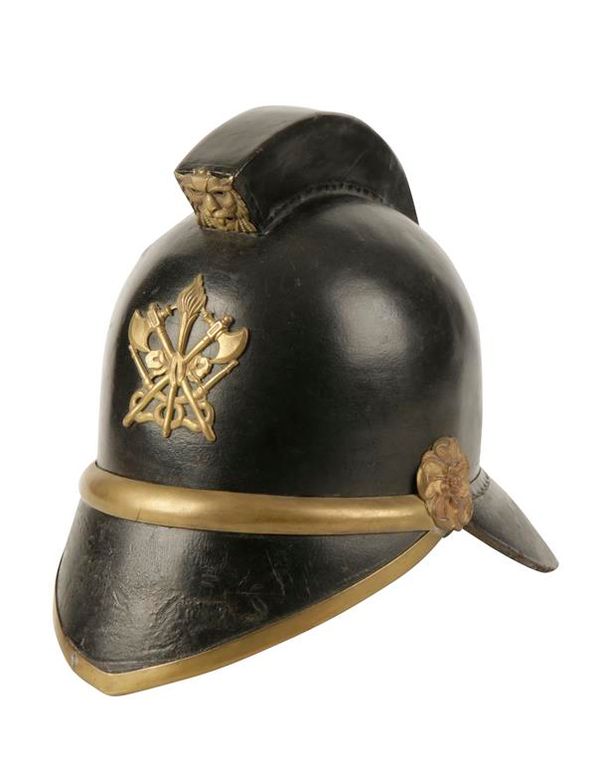 A LEATHER AND BRASS FIRE HELMET from the Andover Volunteers Fire Brigade