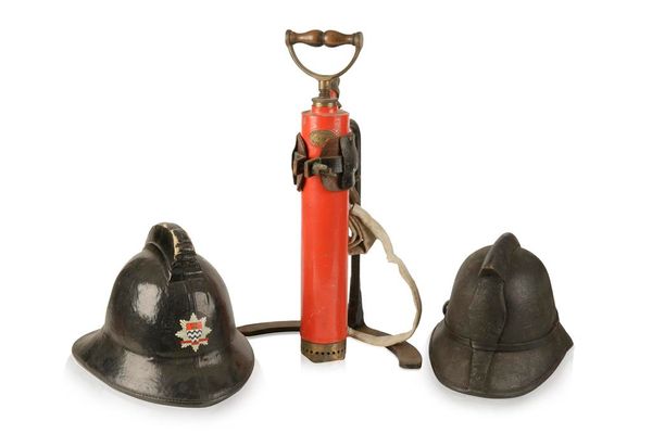 A LEATHER FIRE HELMET from the Letchworth Volunteer Fire Brigade