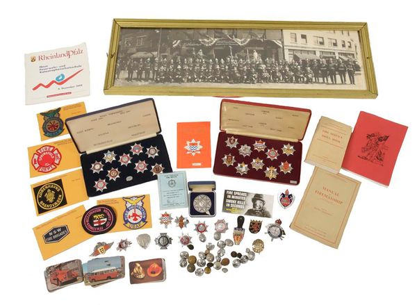 A COLLECTION OF FIRE BRIGADE BADGES