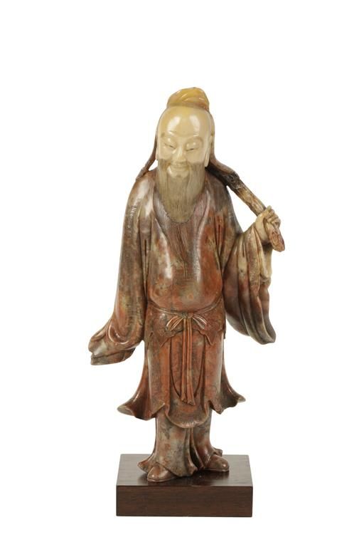 FINE SOAPSTONE CARVED FIGURE OF A SAGE, QING DYNASTY, 18TH CENTURY