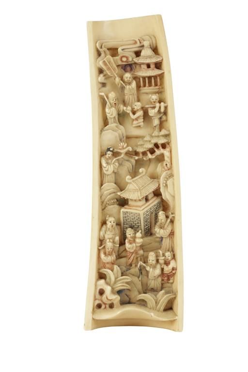 CARVED IVORY AND POLYCHROME PAINTED WRIST REST, QING DYNASTY
