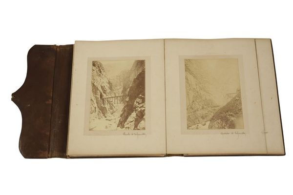 PERU RAILWAYS. EUGENIO COURRET A FOLIO ALBUM OF 57 [OF 58?] MOUNTED ALBUMEN PRINTS