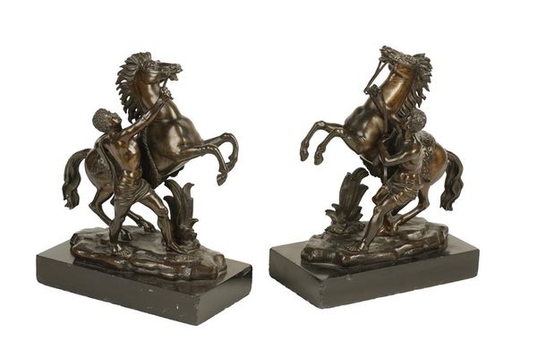 PAIR OF BRONZE MARLEY HORSES