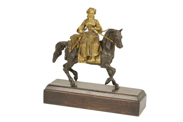 19TH CENTURY BRONZE AND PARCEL GILT FIGURE OF A MAIDEN ON HORSEBACK