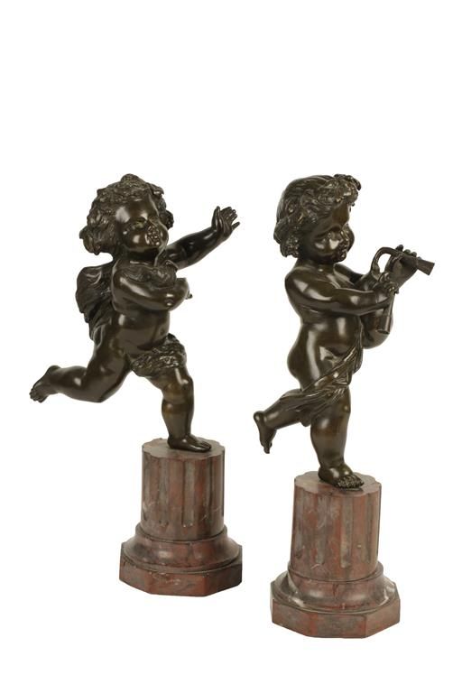 PAIR OF BRONZE PUTTI