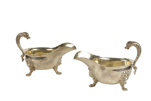 MATCHED PAIR OF GEORGE II AND LATER SILVER SAUCEBOATS