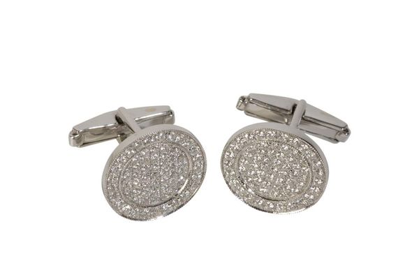 PAIR OF RUB OVER SET DIAMONDS AND WHITE GOLD CUFF LINKS