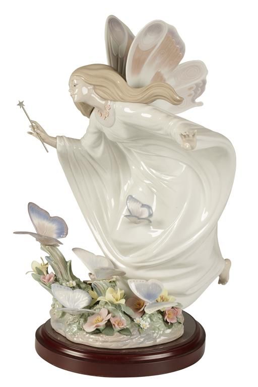 LLADRO: A "FAIRY OF THE BUTTERFLY" GLAZED PORCELAIN FIGURE