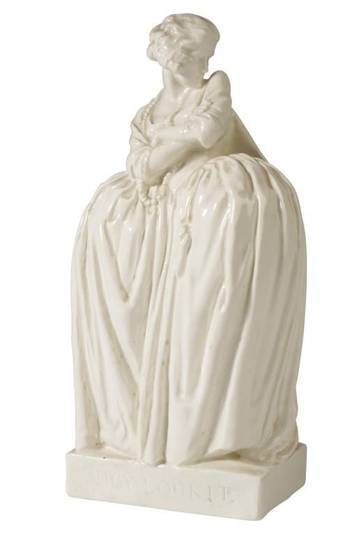 •AGATHA WALKER (1888-1980): A CREAM GLAZED PORCELAIN FIGURINE