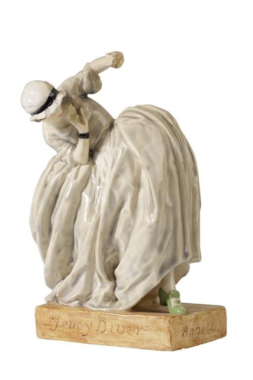 •AGATHA WALKER (1888-1980): A GLAZED PLASTER FIGURINE