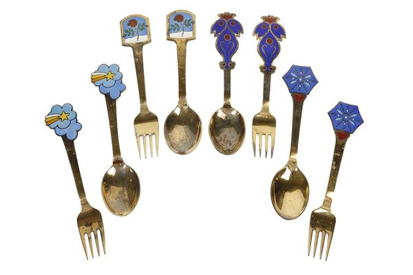 A. MICHELSEN: EIGHT SILVER PARCEL- GILT AND ENAMEL COMMEMORATIVE SPOONS