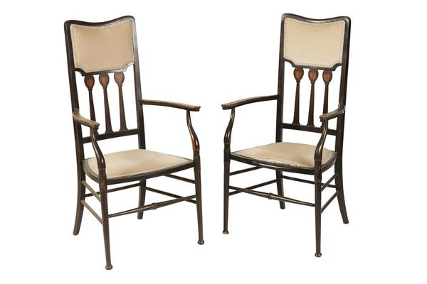 IN THE MANNER OF MORRIS & CO: A PAIR OF ARTS AND CRAFTS ELBOW CHAIRS