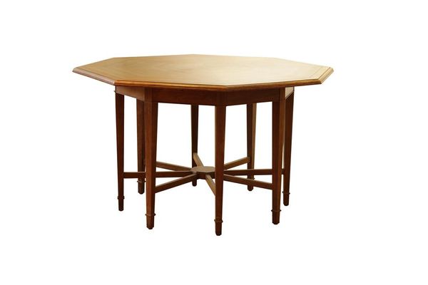 IN THE MANNER OF EDWARD WILLIAM GODWIN: AN OCTAGONAL BLACK BEAN CENTRE TABLE