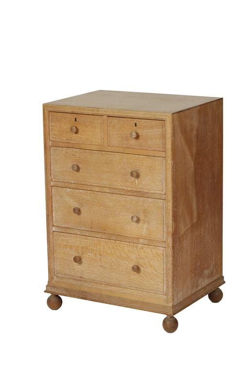 HEAL'S (HEAL AND SON LTD): A LIMED OAK CHEST OF DRAWERS