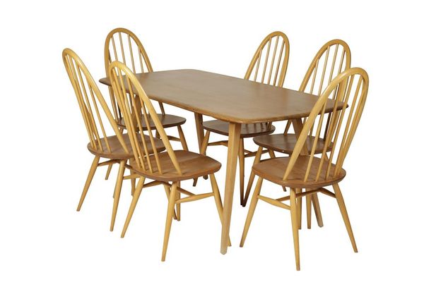 ERCOL: A LIGHT ELM DINING TABLE