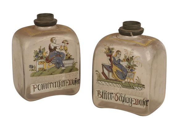 PAIR OF GERMAN ENAMELLED DECANTERS, EARLY 18TH CENTURY