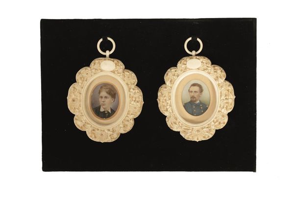 PAIR OF CARVED IVORY CHINESE EXPORT PORTRAIT MINIATURES, 19TH CENTURY