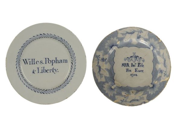 ENGLISH DELFTWARE PLATE, 18th century, inscribed "Willes. Popham & Liberty"