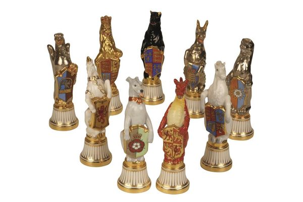 SET OF NINE MINTON PORCELAIN ARMORIAL FIGURES