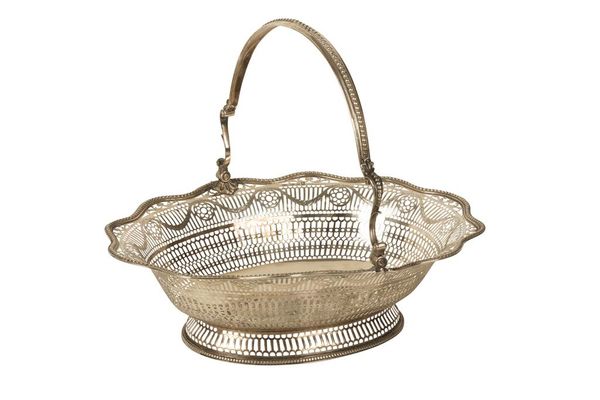 GEORGE III SILVER CAKE BASKET by William Plummer, London, 1774