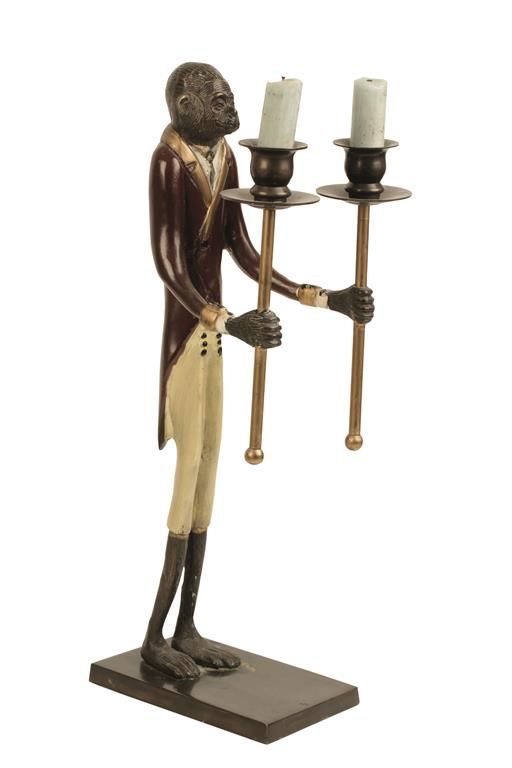 AN ART DECO STYLE COLD PAINTED BRONZE ANTHROPOMORPHIC CANDLESTAND