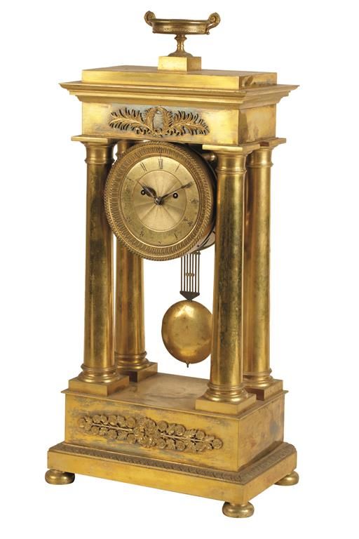 LOUIS XVI STYLE ORMOLU AND GILT METAL PORTICO CLOCK