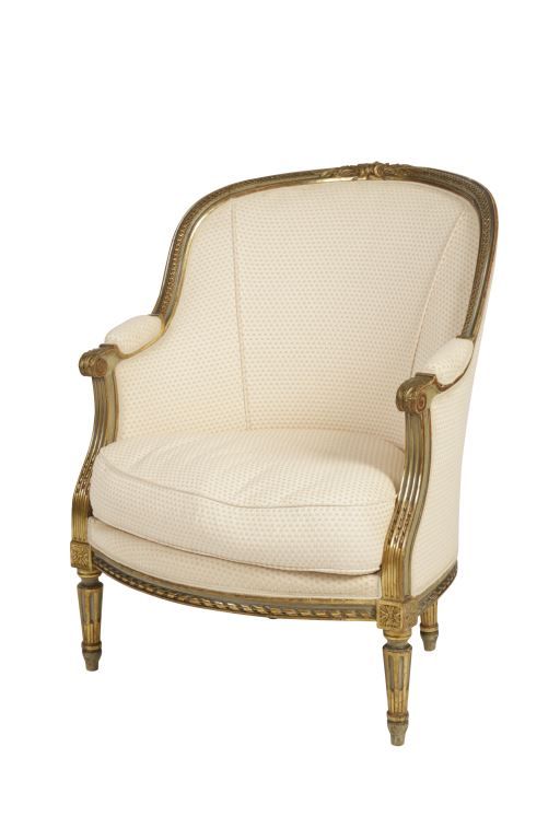 LOUIS XVI STYLE GREY-PAINTED AND PARCEL-GILT BERGERE ARMCHAIR