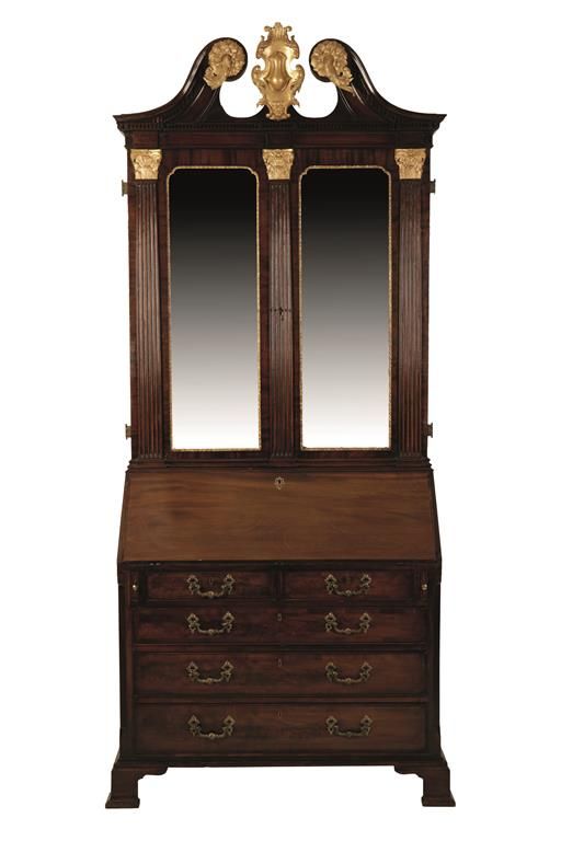 AN IMPRESSIVE GEORGE II MAHOGANY AND GILTWOOD BUREAU BOOKCASE