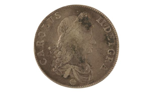A CHARLES II CROWN with the rose below the bust, dated on the reverse 1662