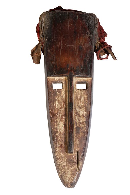 WOODEN AFRICAN MASK of elongated form, possibly Gabon