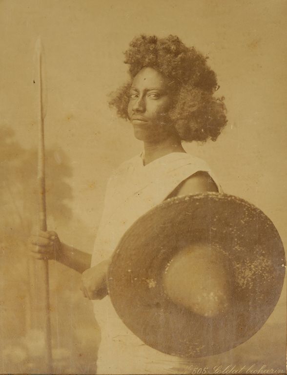 SEPIA PHOTOGRAPH OF A SUDANESE WARRIOR