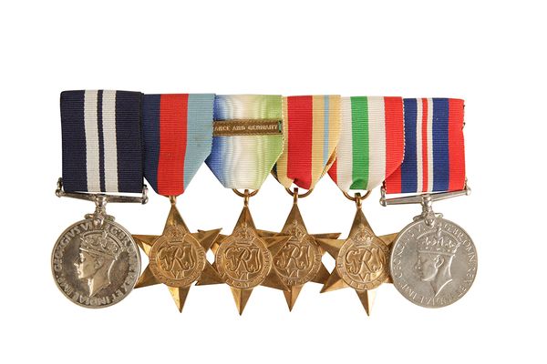 THE REMARKABLE D -DAY DISTINGUISHED SERVICE MEDAL GROUP