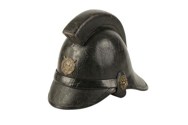 A LEATHER FIRE HELMET from the Glasgow Fire Brigade