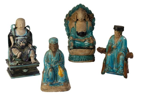 FOUR TURQUOISE-GLAZE POTTERY FIGURES, MING DYNASTY