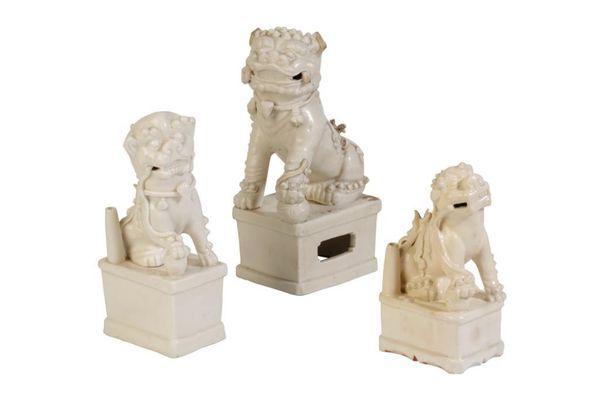 THREE BLANC-DE-CHINE FU LIONS, QING DYNASTY