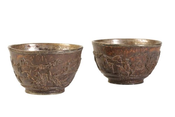 FINE PAIR OF SILVER MOUNTED CARVED COCONUT TEA BOWLS, KANGXI PERIOD