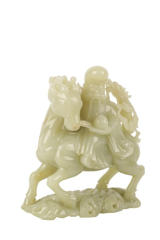 CELADON AND RUSSET JADE CARVED GROUP