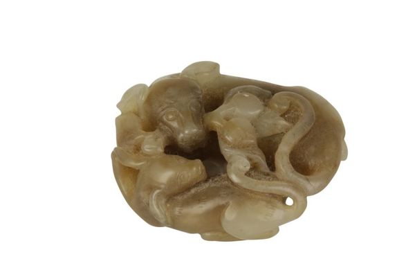 CELADON AND MOTTLED JADE 'TWO DOGS' GROUP, QING DYNASTY