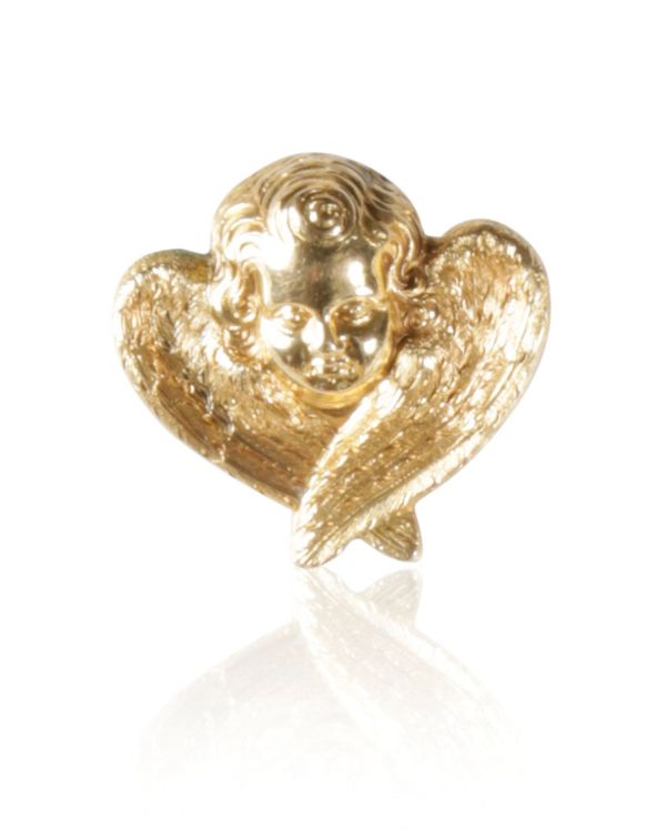 WINGED CHERUB BROOCH/ PENDANT, the embossed cherub head with engraved wings, on unmarked yellow meta