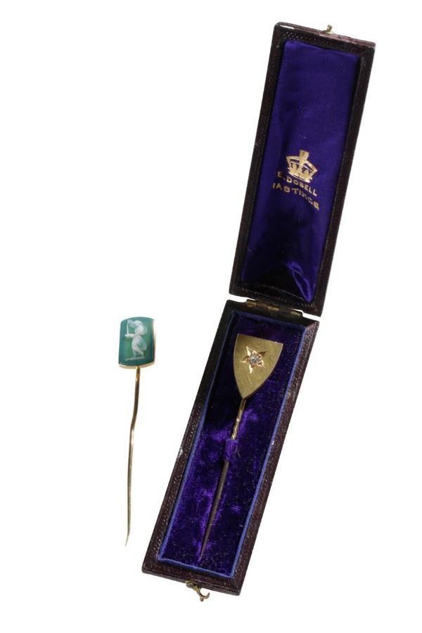 YELLOW METAL STICK PIN SET WITH A SINGLE DIAMOND