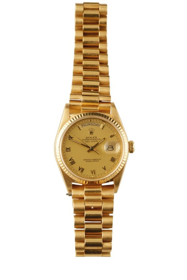 ROLEX: 18CT GOLD OYSTER PERPETUAL DAY-DATE SUPERLATIVE CHRONOMETER GENTLEMAN'S BRACELET WATCH