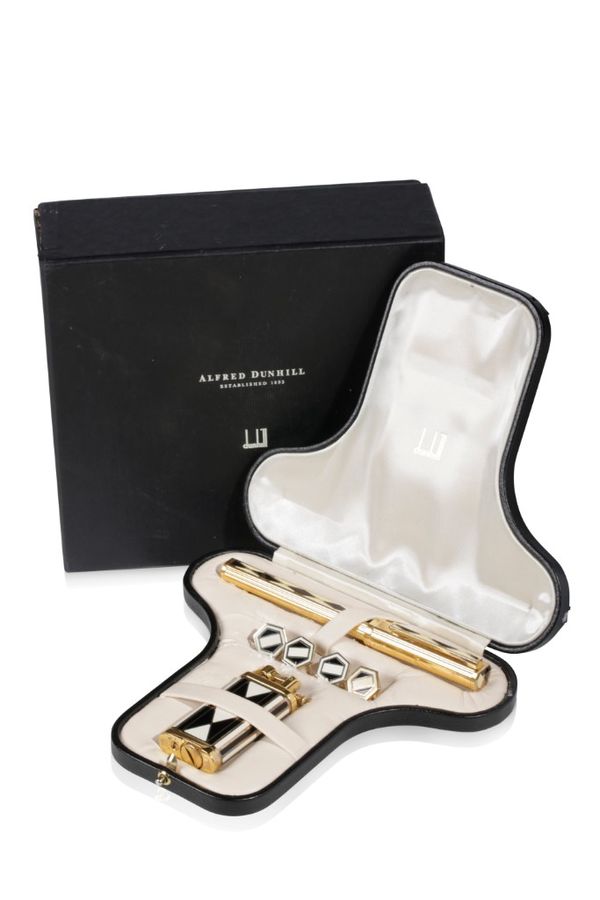 ALFRED DUNHILL: A LIMITED EDITION "CHARLSTON" SILVER GILT GIFT SET