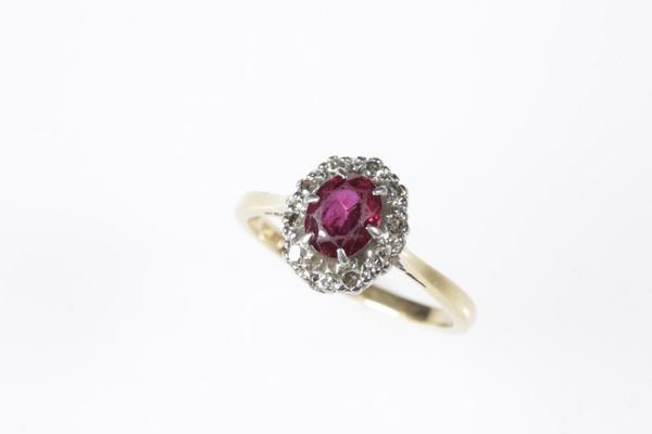 "RUBY" AND DIAMOND CLUSTER RING
