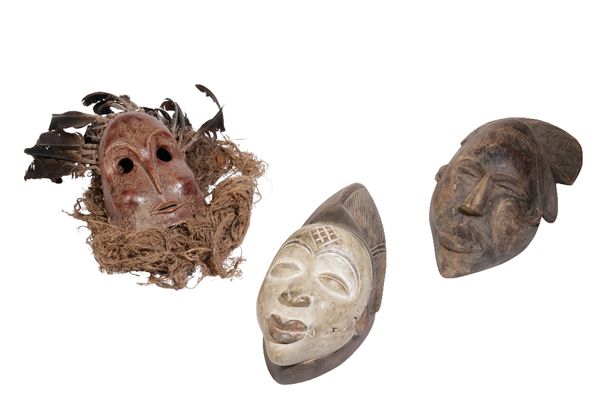 THREE TRIBAL MASKS, PUNU, YAURE AND IBIBIO 