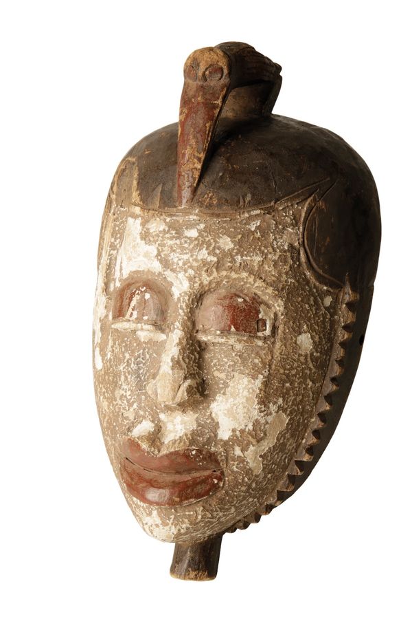 20TH CENTURY WEST AFRICAN CARVED AND PAINTED WOODEN MASK YAURE