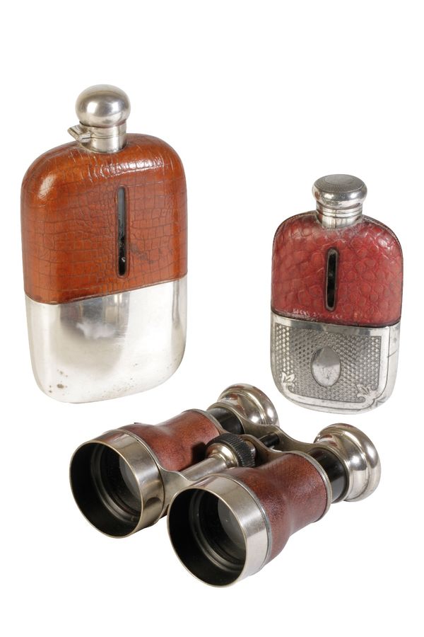 TWO SILVER PLATED AND CROCODILE LEATHER HIP FLASKS