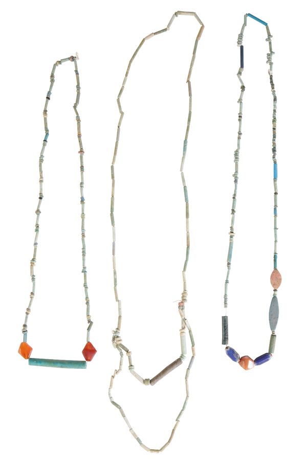 STRING OF ANCIENT GLASS, CERAMIC AND STONE BEADS