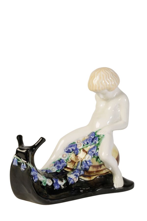 MICHAEL POWOLNY FOR WIENER WERKSTATTE: AN EARTHENWARE FIGURE