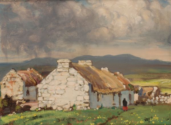 IRISH SCHOOL, 20th century A rural view of whitewashed thatched cottages